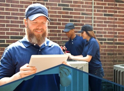 a man holding a rectangular object