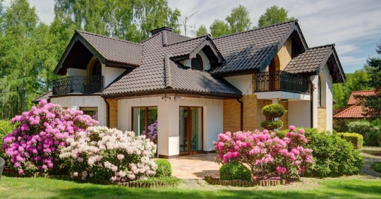 outside of house with flowers