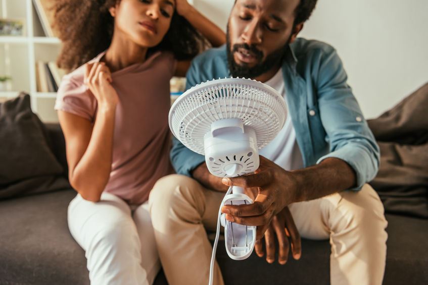couple with fan